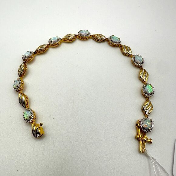 7" Lab created opal and diamond accent tennis bracelet in gold over 925! - Picture 1 of 16